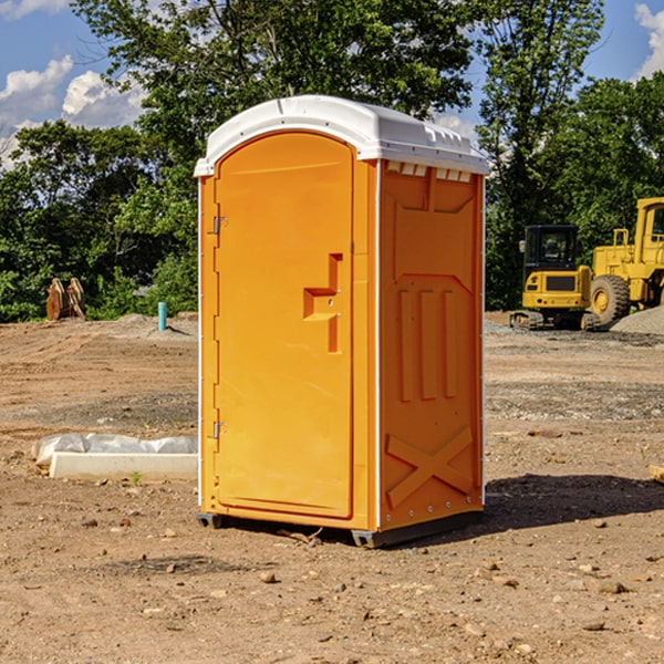 how often are the portable toilets cleaned and serviced during a rental period in Carlos